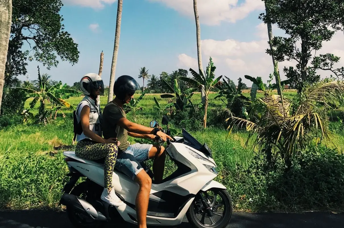 People on scooter roaming around in Bali